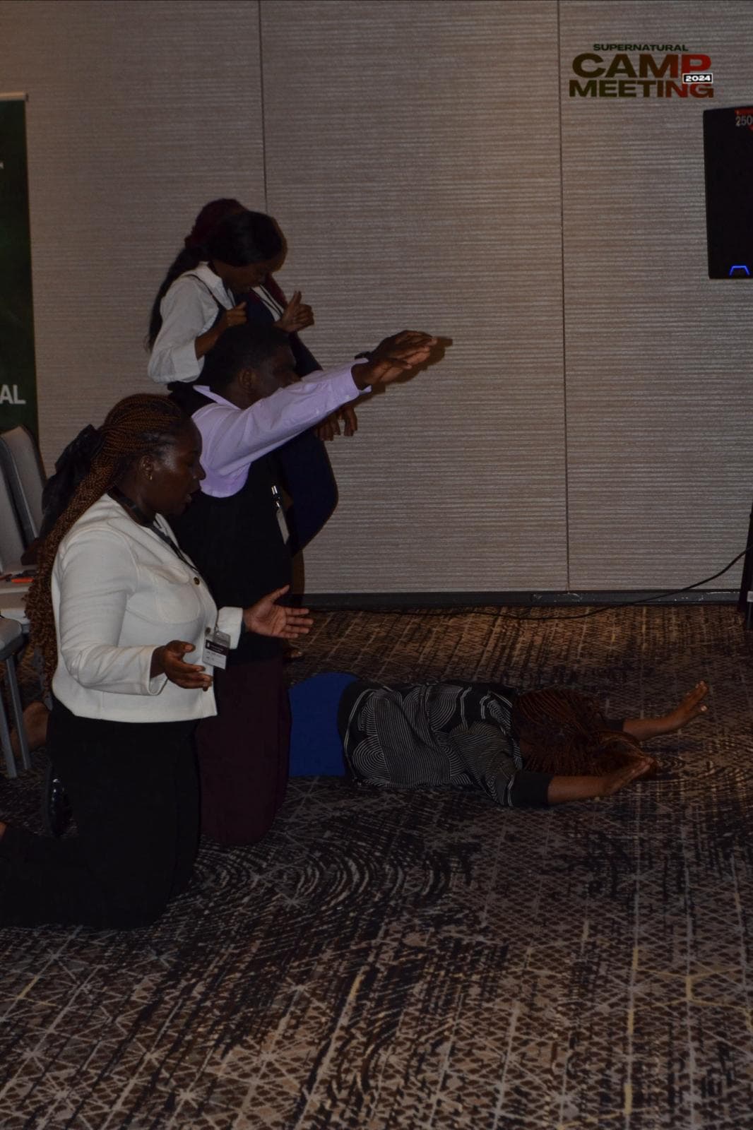 Believers engaged in earnest prayer and worship